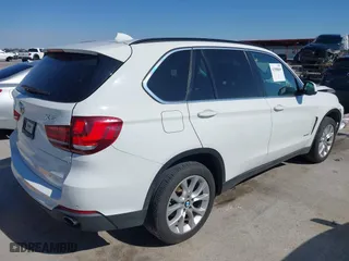 2016 BMW X5 xDrive35i with VIN 5UXKR0C56G0P34365, listed as a IAAI auction lot 41588869 with 105,250 mi miles. Bid and sale history available at carsss.com. Image 4.