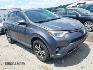 2018 Toyota RAV4 XLE with VIN 2T3WFREV9JW446324, listed as a IAAI auction lot 42612291 with 122,602 mi miles and . Bid and sale history available at DreamBid. Image 1.