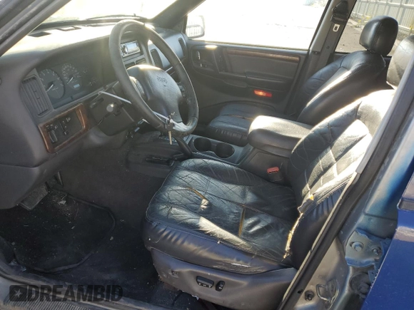 1997 Jeep Grand Cherokee Limited with VIN 1J4GZ78Y8VC737860, listed as a Copart auction lot 72981354 with 292,652 mi miles and Salvage Title. Bid and sale history available at carsss.com. Image 7.