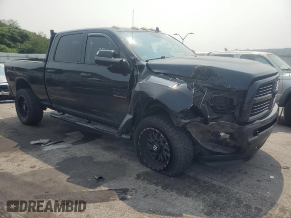 2015 Ram 2500 SLT with VIN 3C6UR5DL9FG693901, listed as a Copart auction lot 67711284 with 104,530 mi miles and Salvage Title. Bid and sale history available at carsss.com. Image 4.