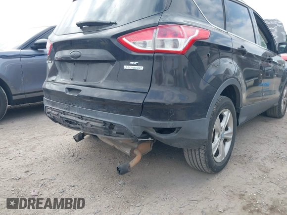2013 Ford Escape SE with VIN 1FMCU0G96DUC34594, listed as a IAAI auction lot 42040437 with 161,847 mi miles and . Bid and sale history available at DreamBid. Image 6.