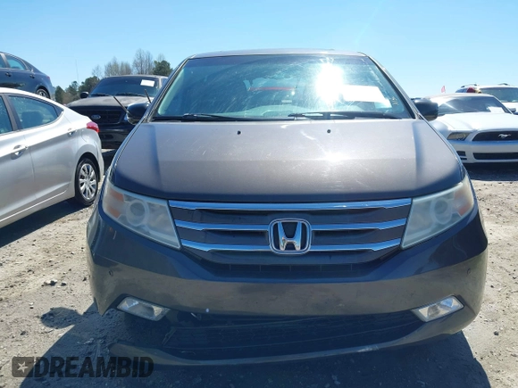 2012 Honda Odyssey Touring with VIN 5FNRL5H91CB057344, listed as a IAAI auction lot 41835272 with 158,854 mi miles. Bid and sale history available at carsss.com. Image 12.