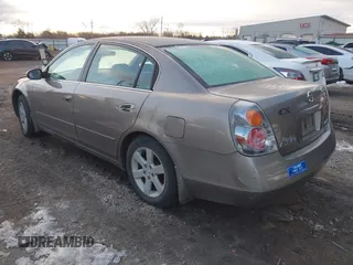 2004 Nissan Altima S with VIN 1N4AL11D44C168527, listed as a IAAI auction lot 41320562 with 94,803 mi miles. Bid and sale history available at carsss.com. Image 3.