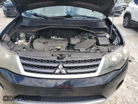2009 Mitsubishi Outlander SE z VIN JA4MT31W89Z001333, wystawiony jako Copart lot #58437935 z przebiegiem 202 003 mil mil oraz Czysty tytuł • Clean title. Historia ofert i sprzedaży dostępna na DreamBid. Obrazek 12.