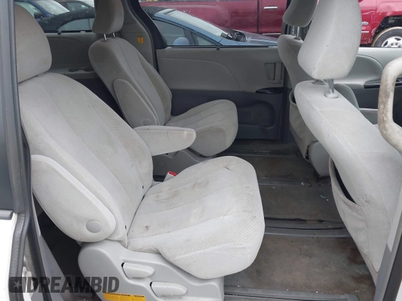 2012 Toyota Sienna LE with VIN 5TDJK3DC3CS048579, listed as a IAAI auction lot 41055074 with 202,791 mi miles. Bid and sale history available at carsss.com. Image 8.