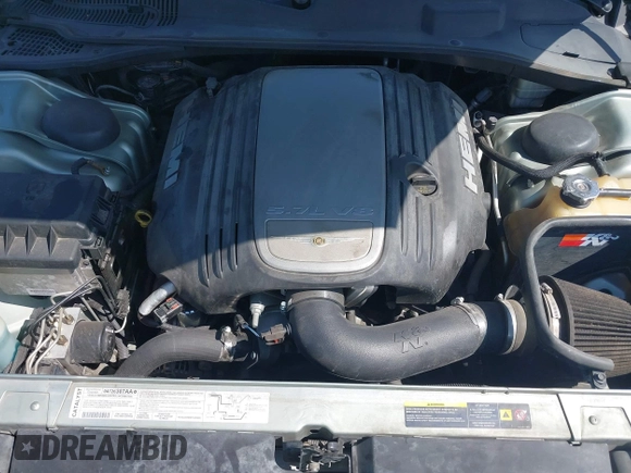 2006 Chrysler 300 C with VIN 2C3LA63H26H130160, listed as a IAAI auction lot 42170192 with 124,206 mi miles. Bid and sale history available at carsss.com. Image 10.