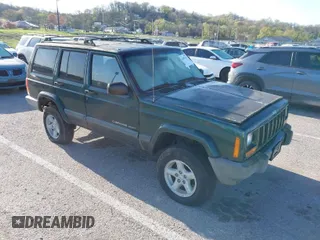 1999 Jeep Cherokee Sport with VIN 1J4FF68SXXL677013, listed as a IAAI auction lot 41993355 with 228,722 mi miles. Bid and sale history available at carsss.com. Image 1.