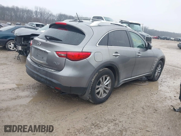 2010 Infiniti FX35 with VIN JN8AS1MW6AM856999, listed as a IAAI auction lot 41051039 with 166,714 mi miles. Bid and sale history available at carsss.com. Image 4.