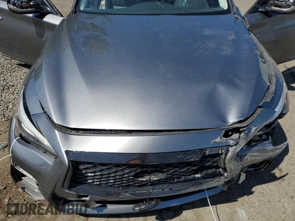 2014 Infiniti Q50 Premium z VIN JN1BV7AR1EM693471, wystawiony jako Copart lot #58991305 z przebiegiem 144 323 mil mil oraz Szkoda całkowita • Salvage title. Historia ofert i sprzedaży dostępna na DreamBid. Obrazek 11.