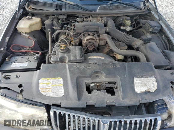 1999 Lincoln Town Car Executive z VIN 1LNHM81W4XY714116, wystawiony jako Copart lot #44424595 z przebiegiem 210 041 mil mil oraz Szkoda całkowita • Salvage title. Historia ofert i sprzedaży dostępna na DreamBid. Obrazek 11.