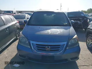 2009 Honda Odyssey EX-L with VIN 5FNRL38759B001130, listed as a IAAI auction lot 42004710 with 142,126 mi miles and . Bid and sale history available at DreamBid. Image 6.