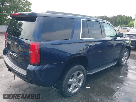 2018 Chevrolet Tahoe LT with VIN 1GNSKBKC7JR256937, listed as a IAAI auction lot 42614438 with 92,794 mi miles and . Bid and sale history available at DreamBid. Image 4.