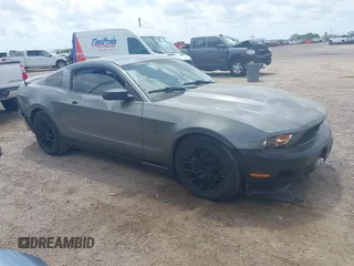 2011 Ford Mustang V6 with VIN 1ZVBP8AM7B5122930, listed as a IAAI auction lot 42050572 with 164,568 mi miles and . Bid and sale history available at DreamBid. Image 1.
