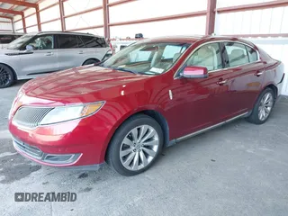 2014 Lincoln MKS z VIN 1LNHL9DK0EG606497, wystawiony jako IAAI lot #42279603 z przebiegiem 129 972 mil mil oraz . Historia ofert i sprzedaży dostępna na DreamBid. Obrazek 17.