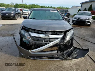 2012 Ford Fusion SEL z VIN 3FAHP0JA3CR106622, wystawiony jako Copart lot #56330425 z przebiegiem 120 880 mil mil oraz Szkoda całkowita • Salvage title. Historia ofert i sprzedaży dostępna na DreamBid. Obrazek 5.