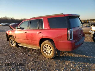 2015 GMC Yukon SLE with VIN 1GKS2AKC2FR190537, listed as a Copart auction lot 87075244 with 244,267 mi miles and Salvage Title. Bid and sale history available at carsss.com. Image 2.
