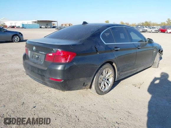 2015 BMW 5 Series 528i xDrive with VIN WBA5A7C52FD624898, listed as a IAAI auction lot 41004092 with 99,668 mi miles and . Bid and sale history available at carsss.com. Image 4.