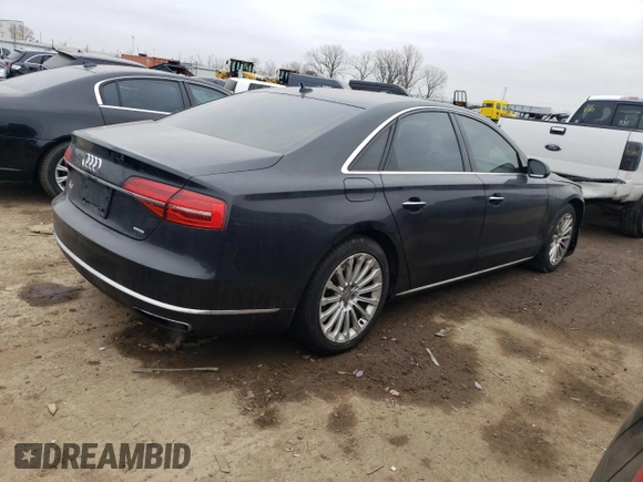 2015 Audi A8 4.0T with VIN WAUJ2AFD3FN024977, listed as a Copart auction lot 39952623 with 102,365 mi miles and . Bid and sale history available at DreamBid. Image 3.