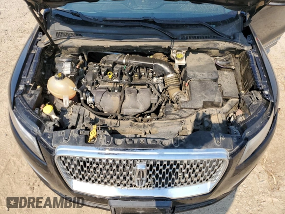 2019 Lincoln MKC Reserve with VIN 5LMCJ3D99KUL02590, listed as a Copart auction lot 48011365 with 100,976 mi miles and Salvage title. Bid and sale history available at DreamBid. Image 12.