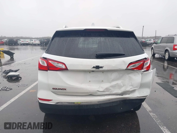 2021 Chevrolet Equinox Premier z VIN 2GNAXNEV7M6112087, wystawiony jako IAAI lot #41102702 z przebiegiem 32 995 mil mil oraz . Historia ofert i sprzedaży dostępna na DreamBid. Obrazek 16.