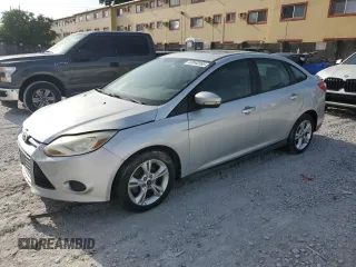 2013 Ford Focus SE with VIN 1FADP3F25DL212152, listed as a Copart auction lot 63040585 with 180,315 mi miles and Clean title. Bid and sale history available at DreamBid. Image 1.