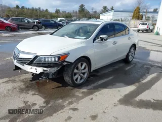 2014 Acura RLX with VIN JH4KC1F34EC004886, listed as a IAAI auction lot 41486879 with 162,425 mi miles. Bid and sale history available at carsss.com. Image 2.