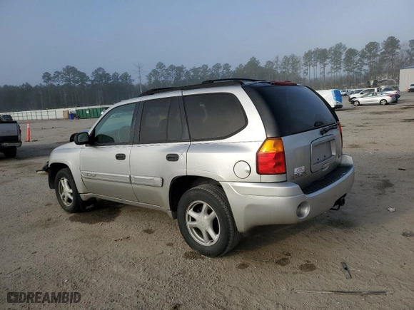 2004 GMC Envoy SLE with VIN 1GKDT13S942422049, listed as a Copart auction lot 43649905 with 150,713 mi miles and Salvage Title. Bid and sale history available at carsss.com. Image 2.
