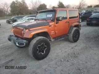2011 Jeep Wrangler Sahara with VIN 1J4GA5D11BL627667, listed as a Copart auction lot 87227054 with 124,009 mi miles and Clean Title. Bid and sale history available at DreamBid. Image 1.