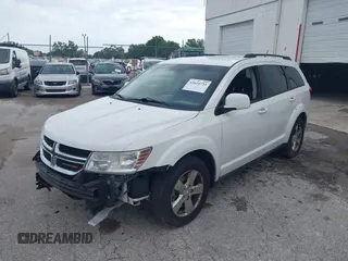 2012 Dodge Journey SXT with VIN 3C4PDCBG3CT331693, listed as a IAAI auction lot 42624751 with 165,480 mi miles and . Bid and sale history available at DreamBid. Image 18.