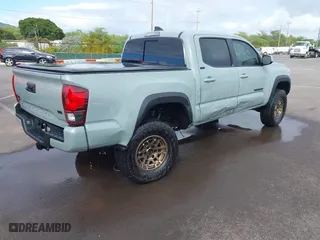 2022 Toyota Tacoma 4WD SR with VIN 3TYCZ5AN7NT065270, listed as a IAAI auction lot 41506454 with 13,097 mi miles. Bid and sale history available at carsss.com. Image 4.