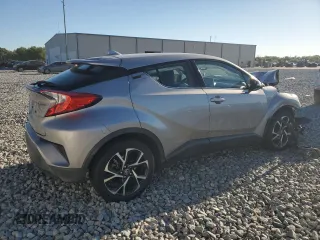 2019 Toyota C-HR XLE z VIN NMTKHMBX6KR070507, wystawiony jako Copart lot #50090175 z przebiegiem 109 471 mil mil oraz Szkody całkowita. Historia ofert i sprzedaży dostępna na DreamBid. Obrazek 3.