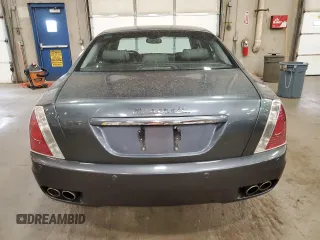 2005 Maserati Quattroporte z VIN ZAMCE39A350017390, wystawiony jako Copart lot #72455664 z przebiegiem 50 394 mil mil oraz Szkoda całkowita • Salvage title. Historia ofert i sprzedaży dostępna na DreamBid. Obrazek 6.