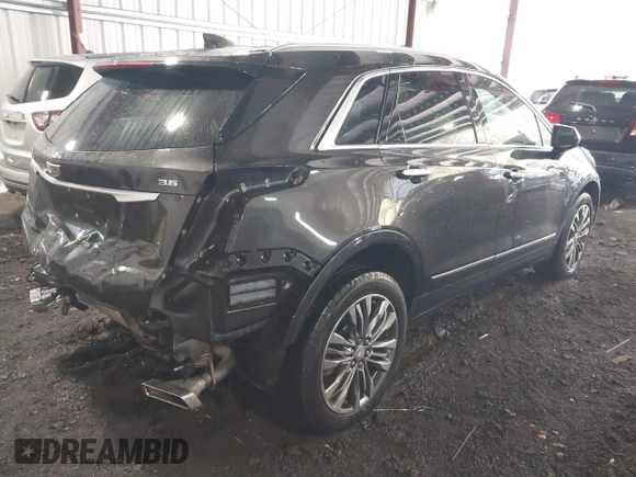 2019 Cadillac XT5 Luxury FWD with VIN 1GYKNCRS6KZ123035, listed as a IAAI auction lot 41588690 with 82,365 mi miles and . Bid and sale history available at DreamBid. Image 4.