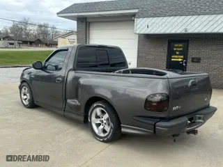 2003 Ford F-150 Lightning with VIN 2FTRF073X3CA56501, listed as a IAAI auction lot 42083560 with 112,754 mi miles. Bid and sale history available at carsss.com. Image 3.