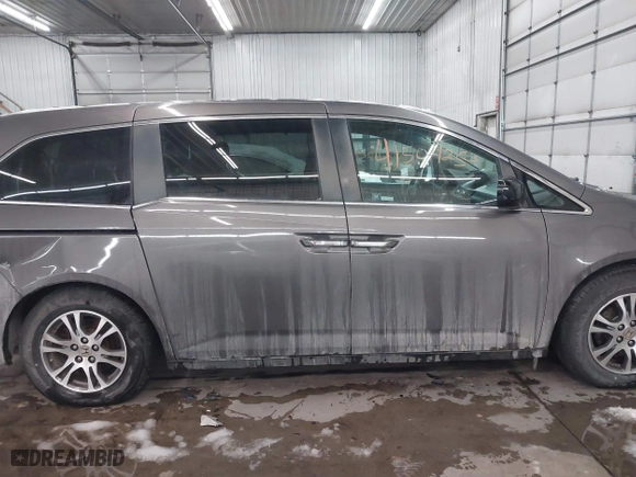 2012 Honda Odyssey EX-L with VIN 5FNRL5H66CB101151, listed as a IAAI auction lot 41504250 with 261,836 mi miles. Bid and sale history available at carsss.com. Image 13.