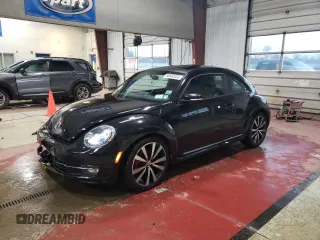 2012 Volkswagen Beetle Turbo with VIN 3VWVA7AT4CM665261, listed as a Copart auction lot 50562025 with 62,570 mi miles and Salvage Title. Bid and sale history available at DreamBid. Image 1.