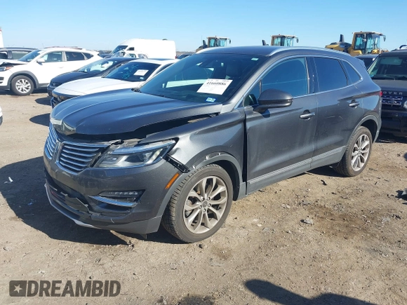 2018 Lincoln MKC Select with VIN 5LMCJ2D9XJUL08066, listed as a IAAI auction lot 41660886 with 80,070 mi miles and . Bid and sale history available at DreamBid. Image 2.