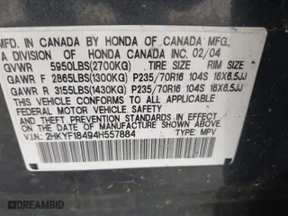 2004 Honda Pilot EX with VIN 2HKYF18494H557884, listed as a IAAI auction lot 42075748 with 205,723 mi miles. Bid and sale history available at carsss.com. Image 9.