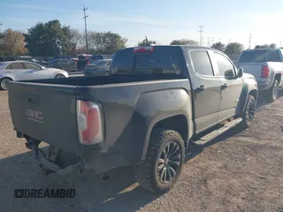 2021 GMC Canyon 2WD Elevation with VIN 1GTG5CEN6M1258058, listed as a IAAI auction lot 41146462 with 147,277 mi miles. Bid and sale history available at carsss.com. Image 4.