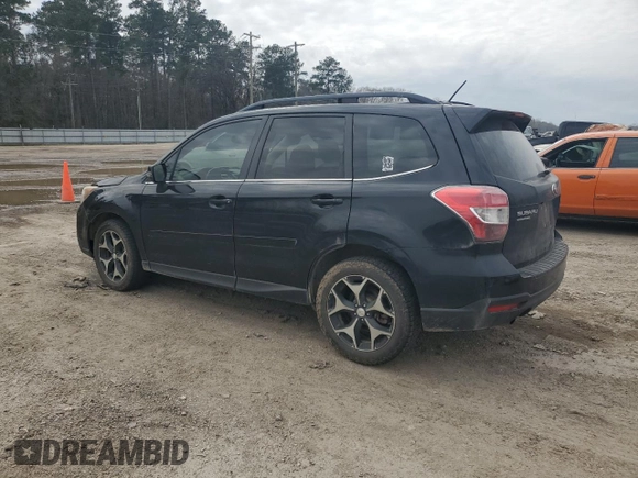 2014 Subaru Forester XT Touring with VIN JF2SJGMC2EH534565, listed as a Copart auction lot 44773305 with 142,537 mi miles and Salvage Title. Bid and sale history available at DreamBid. Image 2.