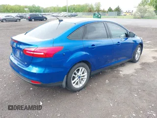 2018 Ford Focus SE z VIN 1FADP3F29JL235302, wystawiony jako IAAI lot #42262964 z przebiegiem 85 127 mil mil oraz . Historia ofert i sprzedaży dostępna na DreamBid. Obrazek 4.