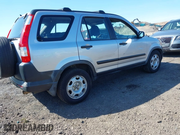 2006 Honda CR-V LX with VIN JHLRD78586C029065, listed as a IAAI auction lot 42043651 with 191,318 mi miles and . Bid and sale history available at carsss.com. Image 4.
