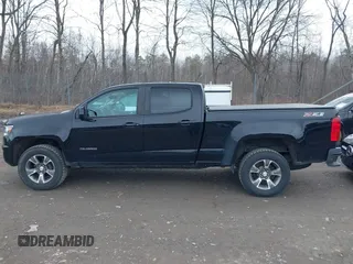 2019 Chevrolet Colorado 4WD Z71 z VIN 1GCGTDEN6K1181460, wystawiony jako IAAI lot #41815027 z przebiegiem 103 283 mil mil oraz . Historia ofert i sprzedaży dostępna na DreamBid. Obrazek 14.