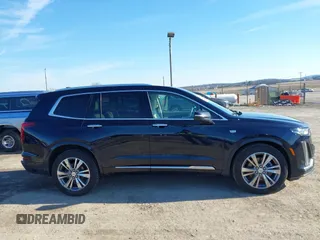 2021 Cadillac XT6 Premium Luxury z VIN 1GYKPDRS8MZ175544, wystawiony jako IAAI lot #41591775 z przebiegiem 39 290 mil mil oraz . Historia ofert i sprzedaży dostępna na DreamBid. Obrazek 13.