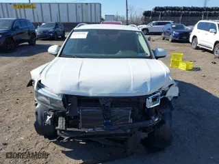 2022 Volkswagen Taos SE with VIN 3VVWX7B2XNM098635, listed as a IAAI auction lot 41747316 with 31,051 mi miles. Bid and sale history available at carsss.com. Image 12.