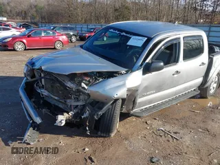 2014 Toyota Tacoma with VIN 3TMLU4EN5EM135783, listed as a IAAI auction lot 41520091 with 188,973 mi miles. Bid and sale history available at carsss.com. Image 6.