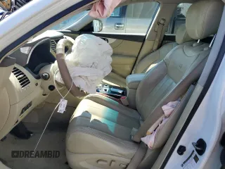 2014 Infiniti QX70 z VIN JN8CS1MU8EM450011, wystawiony jako Copart lot #47757235 z przebiegiem Nie podano mil oraz Szkoda całkowita • Salvage title. Historia ofert i sprzedaży dostępna na DreamBid. Obrazek 7.