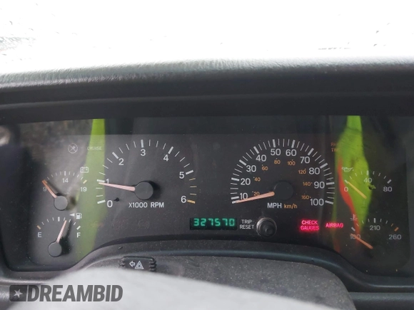 2000 Jeep Cherokee Classic with VIN 1J4FF58S4YL136213, listed as a IAAI auction lot 41227447 with 327,570 mi miles. Bid and sale history available at carsss.com. Image 7.