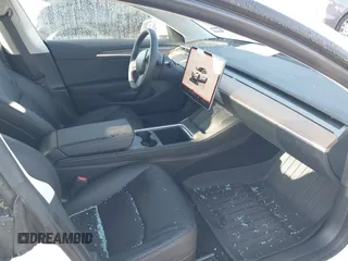 2023 Tesla Model 3 Long Range with VIN 5YJ3E1EB6PF633550, listed as a IAAI auction lot 41861278 with 45,743 mi miles and . Bid and sale history available at DreamBid. Image 5.