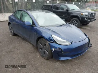 2023 Tesla Model 3 Long Range with VIN 5YJ3E1EB5PF704463, listed as a IAAI auction lot 41916627 with 14,305 mi miles and . Bid and sale history available at DreamBid. Image 1.